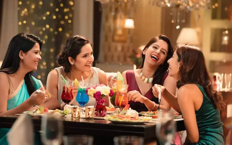 Ladies enjoying kitty party at Annakoot Restaurant Vrindavan with pure vegetarian buffet